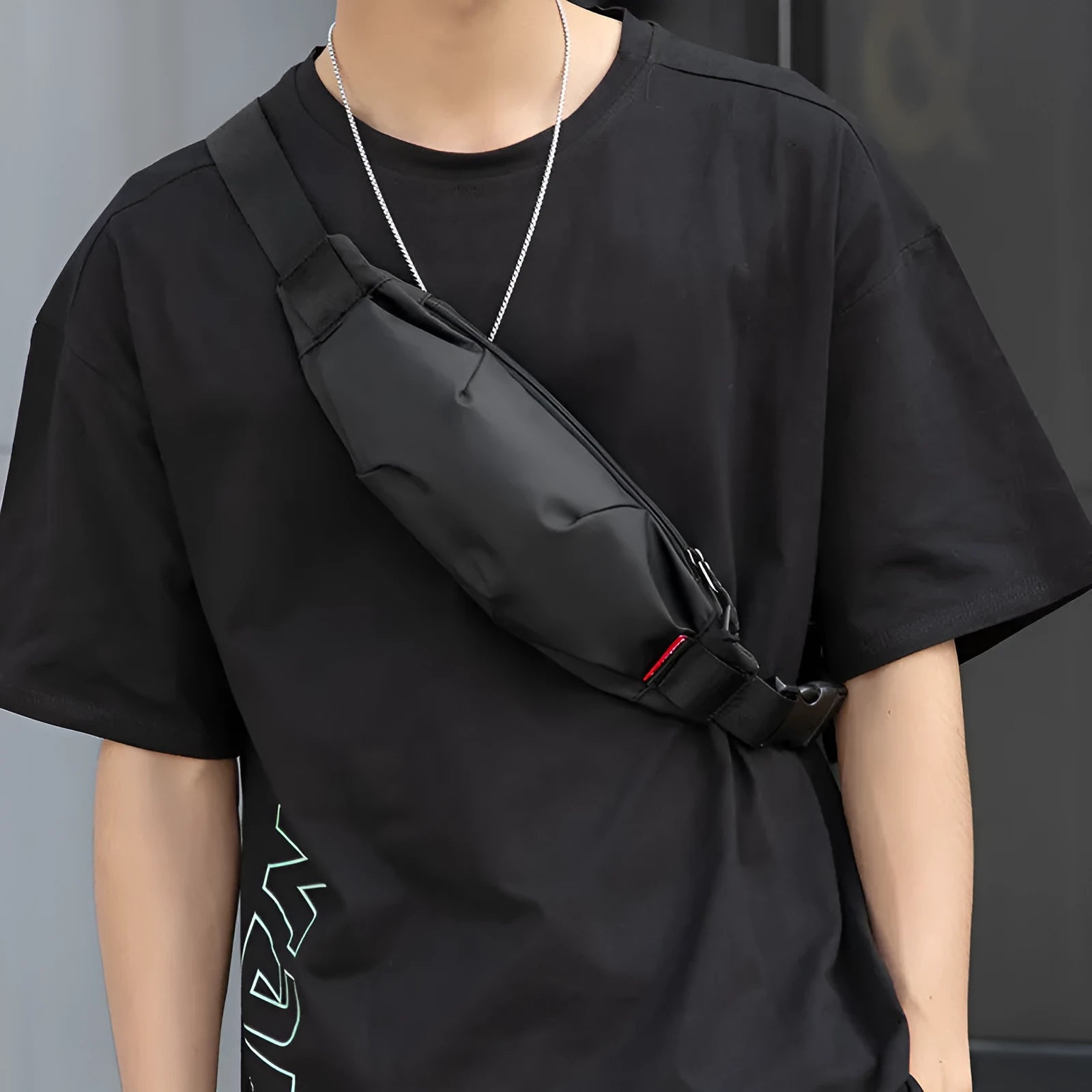Men's black oxford cloth crossbody waist bag with internal organisation pockets