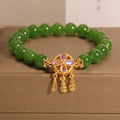 Green jasper crystal four-leaf clover dream catcher pendant on women's crystal bracelet