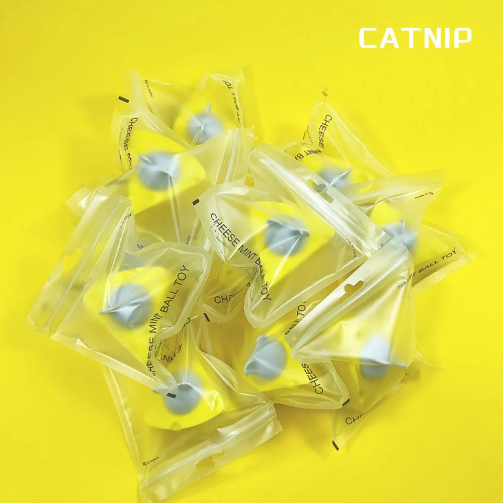 Yellow catnip and silvervine chew toy balls for indoor cat teeth cleaning and entertainment