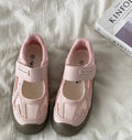 Pink women's Mary Jane canvas shoes with hollow-out upper, flat heel, low top and rubber sole