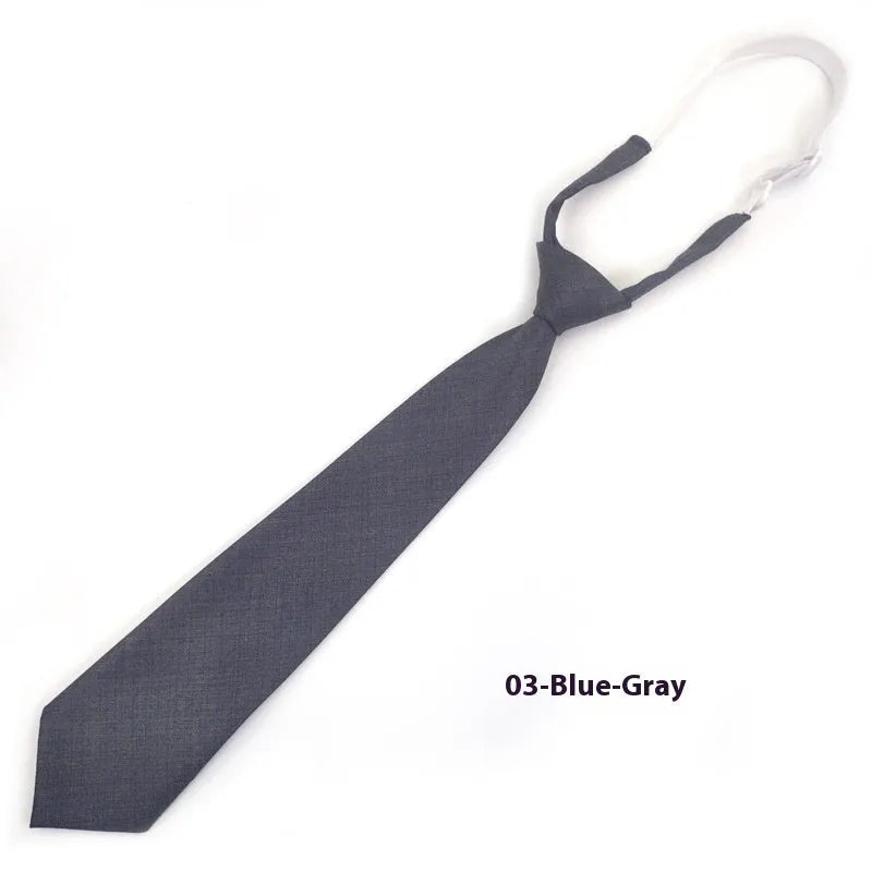 Men's solid colour cotton arrow style bow tie in navy blue.