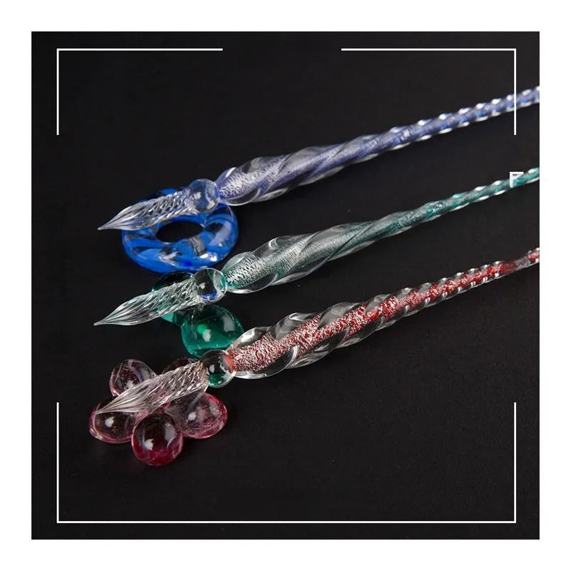Transparent glass crystal pen with coloured ink dipped in water art effect showing coloured glaze decorative technique