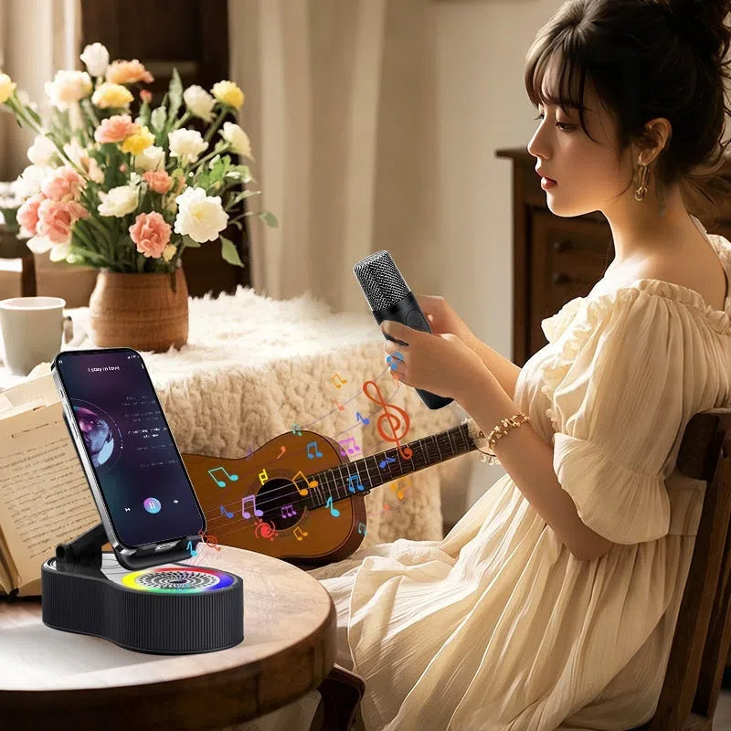 5-in-1 rotating adjustable phone stand power bank Bluetooth speaker in black with single microphone