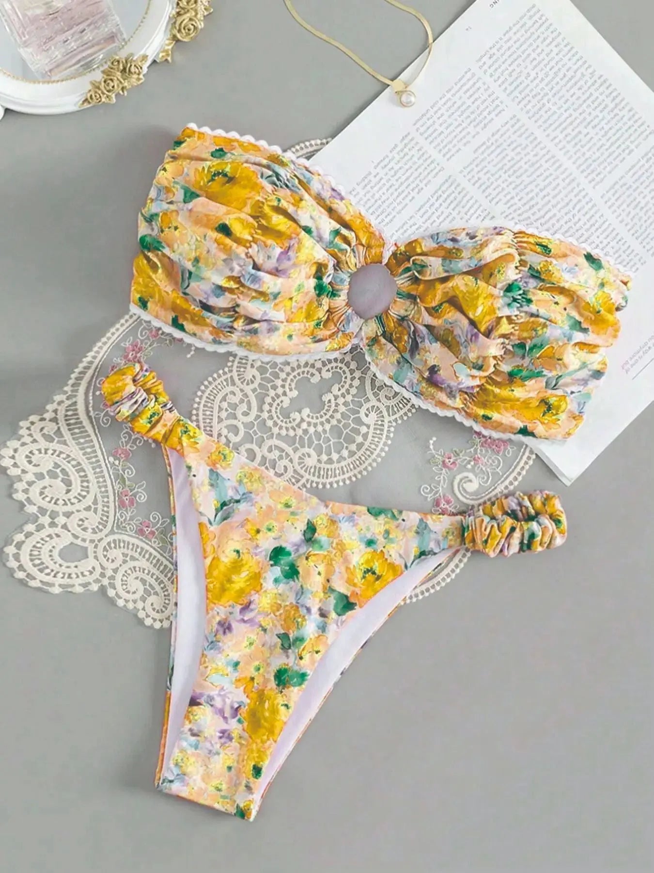 Women's floral print lace detail tube top bikini with matching shorts in blue, yellow, pink, or multi-colour.