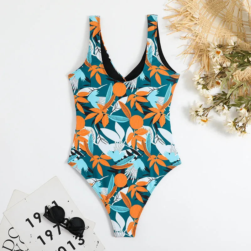 Women's high waist one-piece swimsuit in a printed pattern, shown in black and white colour options.