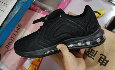 Men's black lace-up air cushion running shoes with a thick sole and round toe.