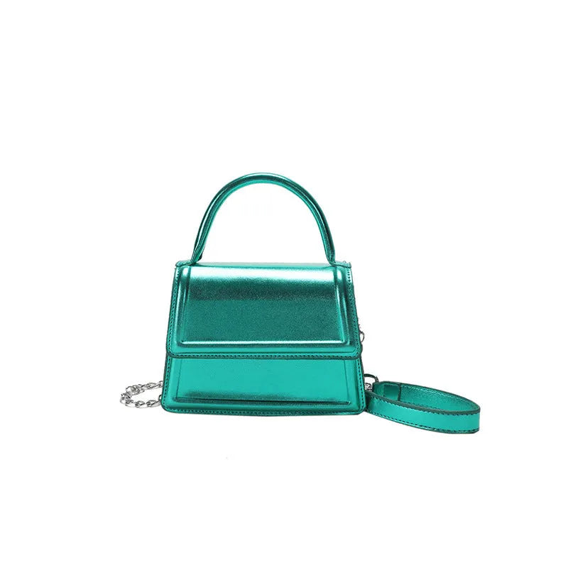 Retro shoulder bag in horizontal square shape with crossbody strap and sewing line detail