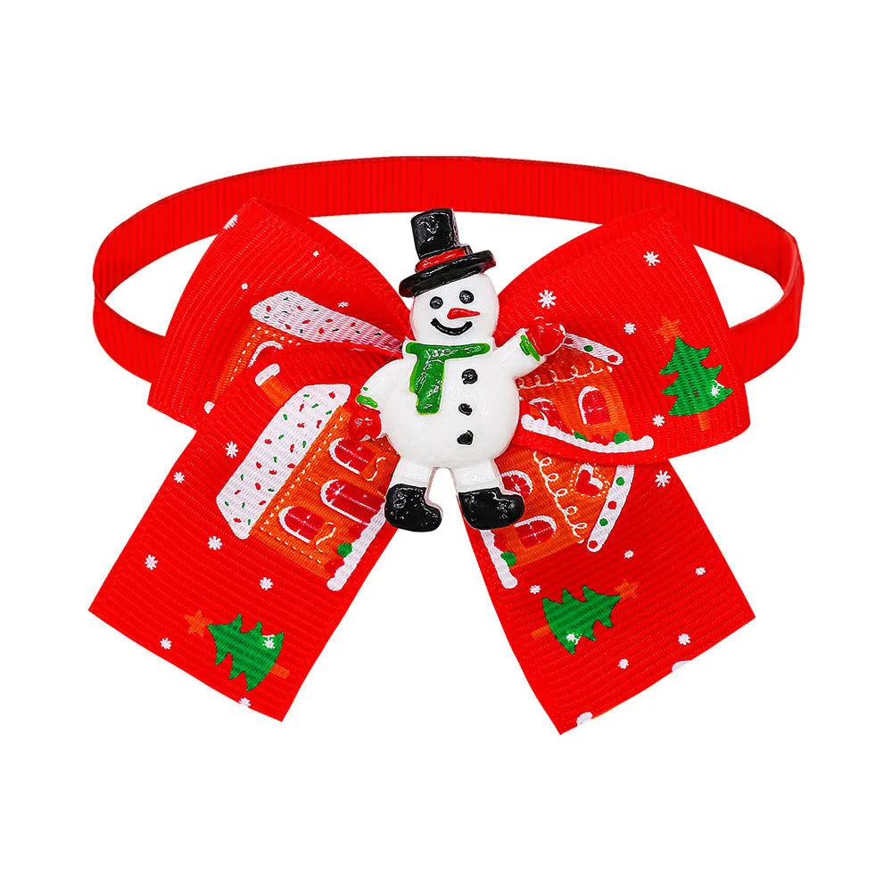 Red and green polyester Christmas pet bow tie in British style on a white background