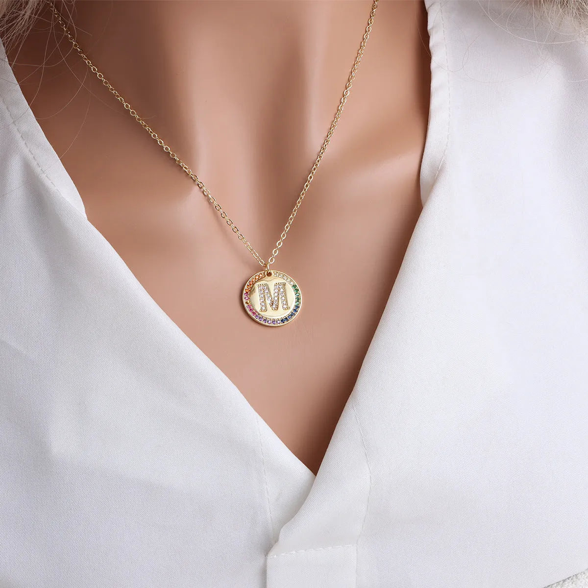 Gold English letter round pendant necklace with colourful crystals on clavicle length chain