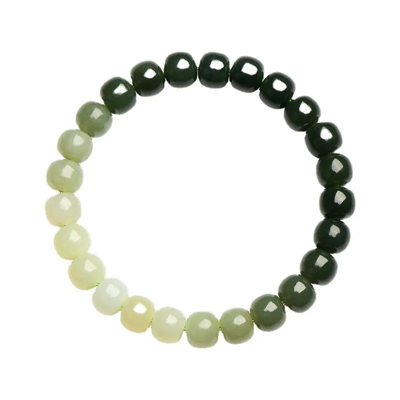 Natural Hetian jade bracelet with gradient clear water colour and polished beads.