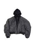 Black double-layer fake two-piece hooded pilot jacket with side seam pockets on a model