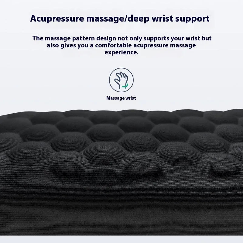 Grey and black memory foam mouse wrist rests with cloth or leather covers on a desk.