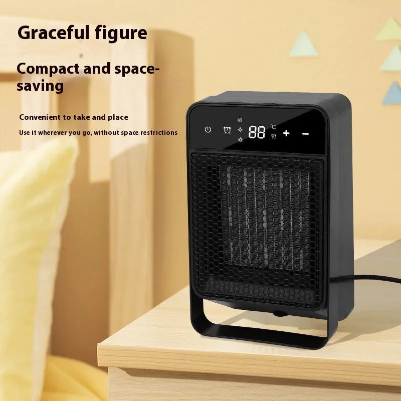Black desktop warm air blower heater with touch screen digital display and remote control on a wooden desk.