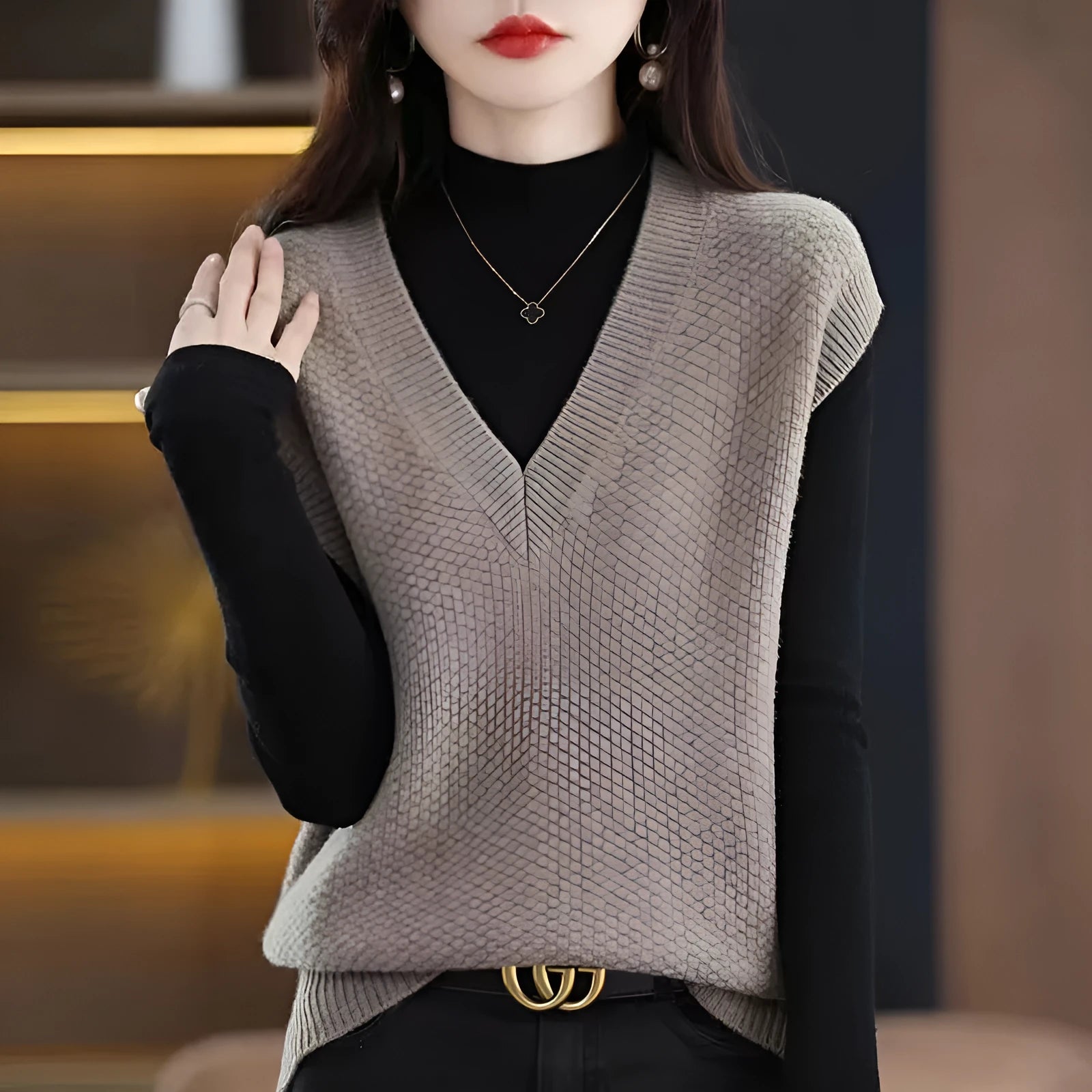Women's V-neck sleeveless vest pullover with 3D pattern in acrylic knit, shown in multiple colour options