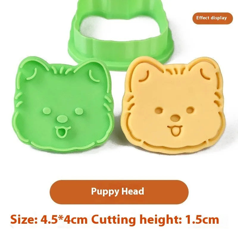 Three dimensional plastic puppy cartoon biscuit mould showing character designs