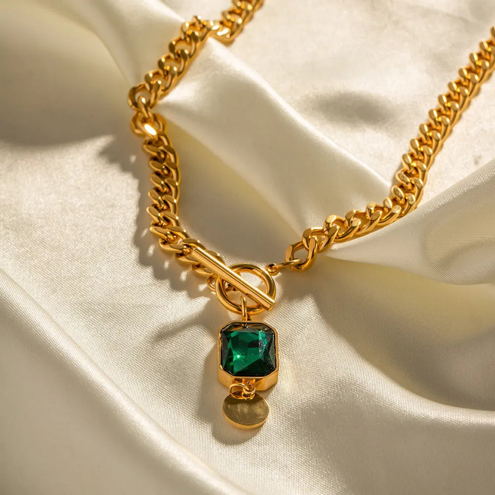 Gold electroplated zircon pendant necklace with geometric round design on titanium steel chain