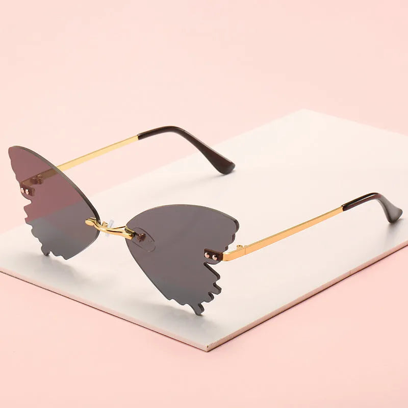 Butterfly rimless sunglasses in vintage style with UV400 protection and plastic metal frame