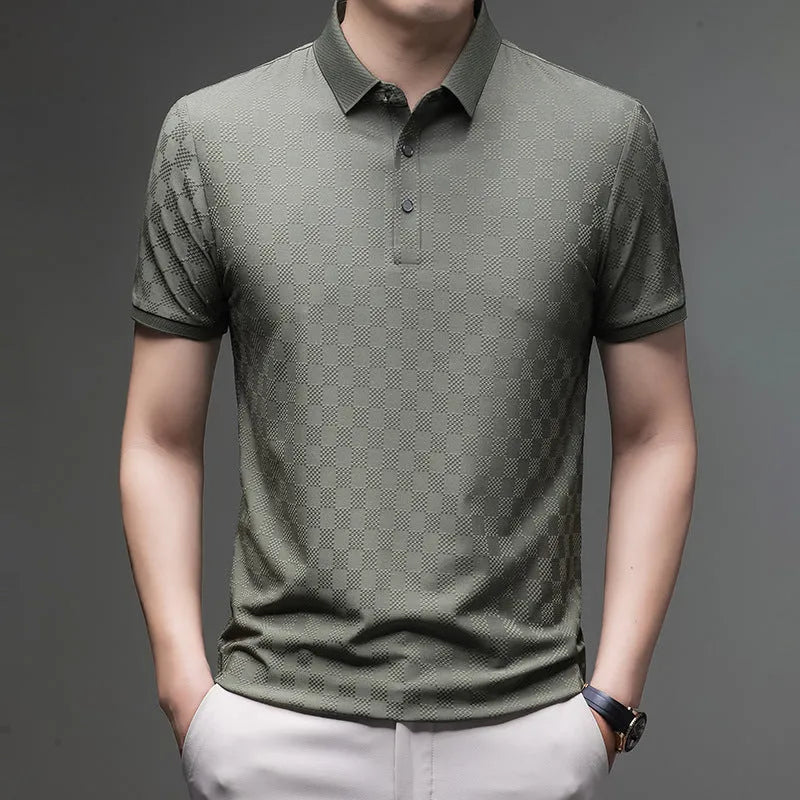 Man wearing a thin black V-neck t-shirt with a rhombus pattern and a side slit detail on the hem.
