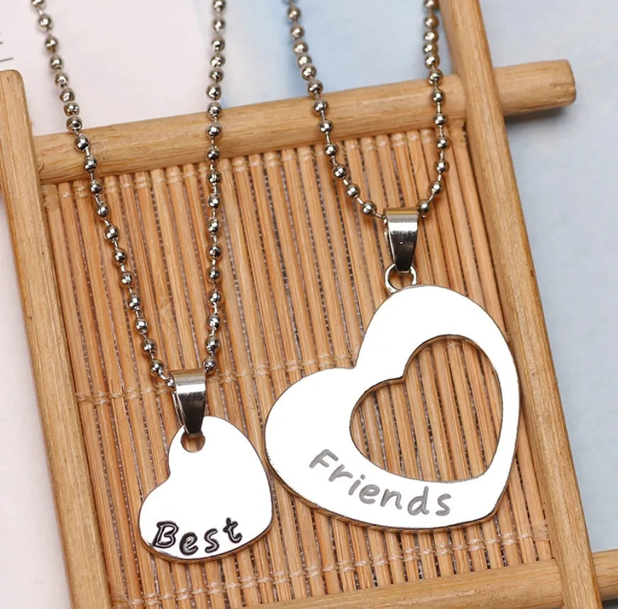 Two silver heart-shaped alloy puzzle necklaces on a cross chain, set of two, women's jewellery