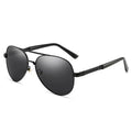 Gold frame men's polarised sunglasses with dragon-phoenix temple detail and grey lenses on a table.