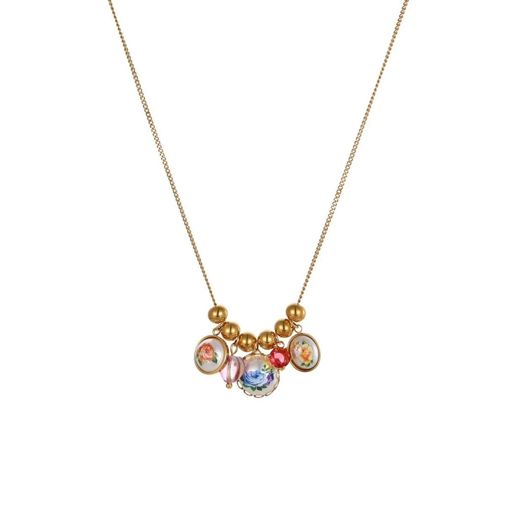 Vintage sunflower stainless steel necklace with 18K gold electroplating, pendant on display, two colour variants available