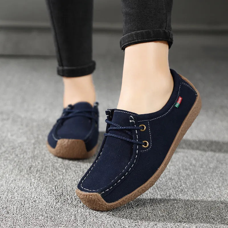 Women's lace-up flat shoes with frosted upper, rubber sole, round toe, and front-tie fastening