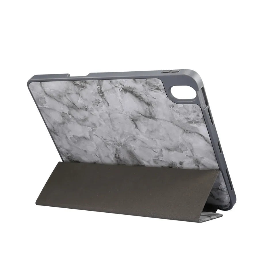 Tri-fold marbling pattern leather-style iPad case in dark grey, showing the integrated pen slot on the side.