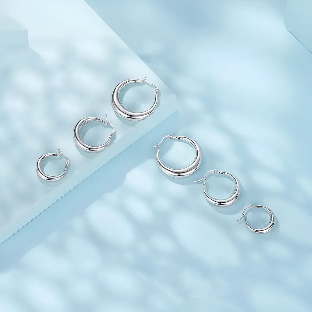 Copper geometric ring ear clip earrings with silver electroplated finish