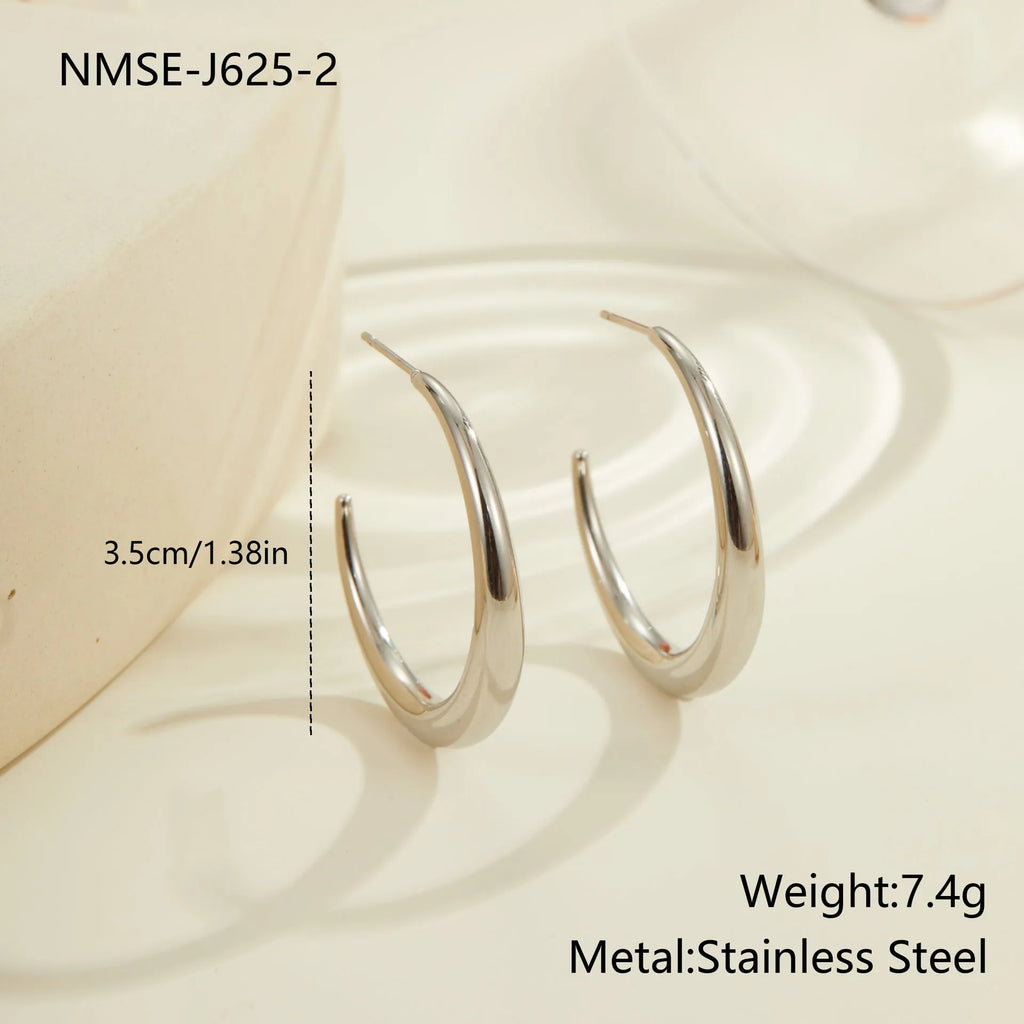 Geometric round hoop earrings in stainless steel with gold or steel finishes in large and small sizes