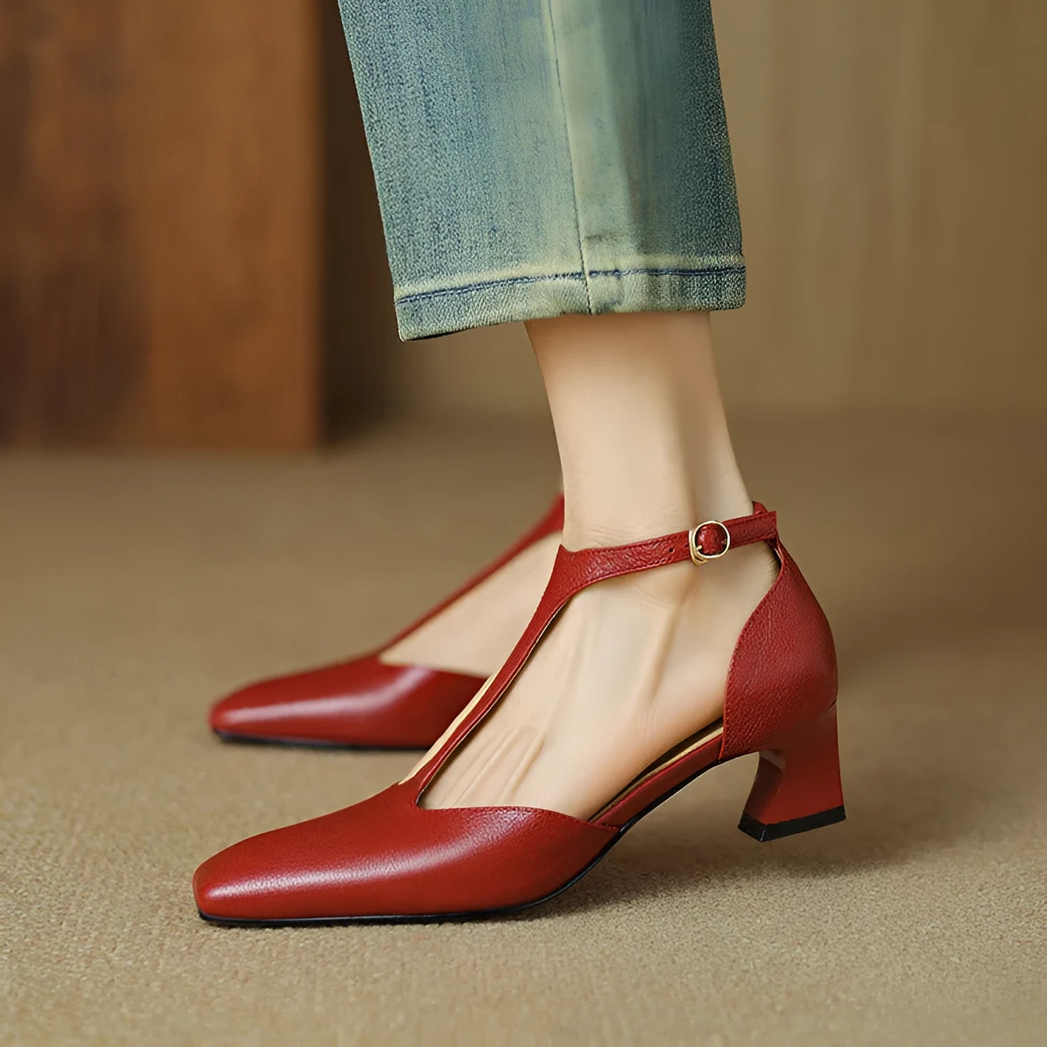 Wine red sheepskin leather high heel shoes with square toe and chunky retro heel, showing buckle fastening