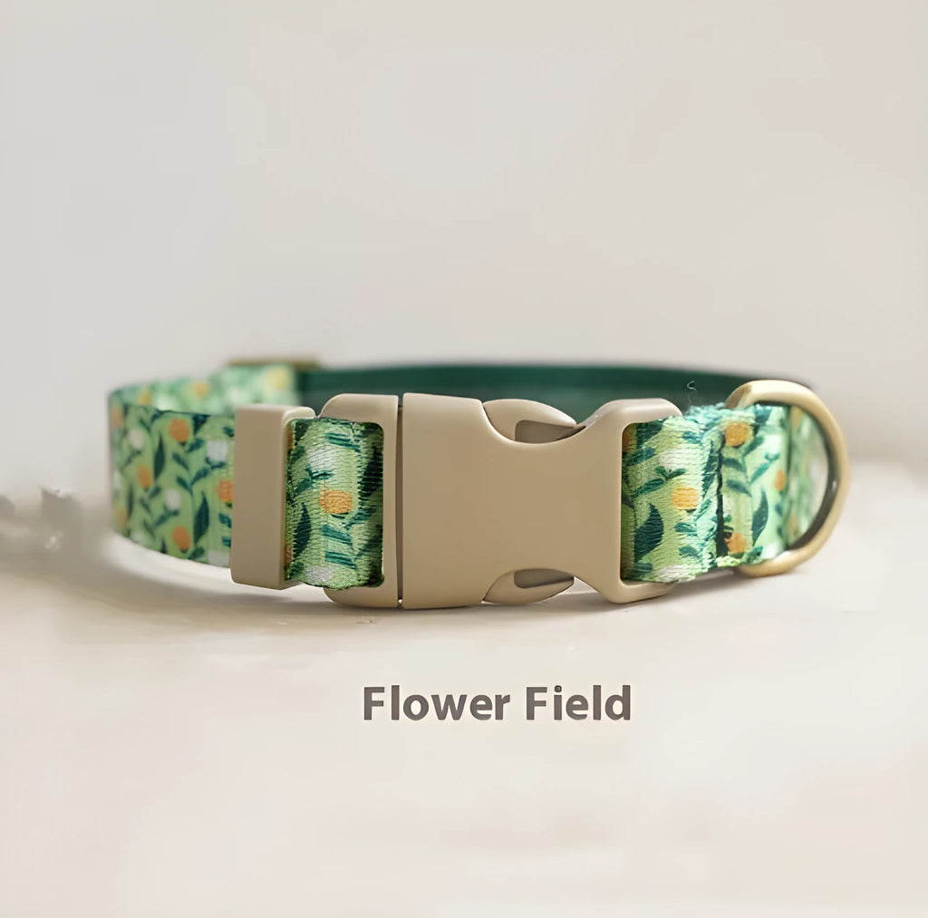 Flower patterned nylon pet collar with metal buckle, shown in Hanada colour on a size chart.