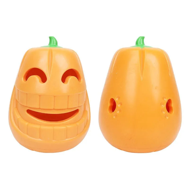Halloween pumpkin shaped interactive dog chew toy with treat dispensing funnel