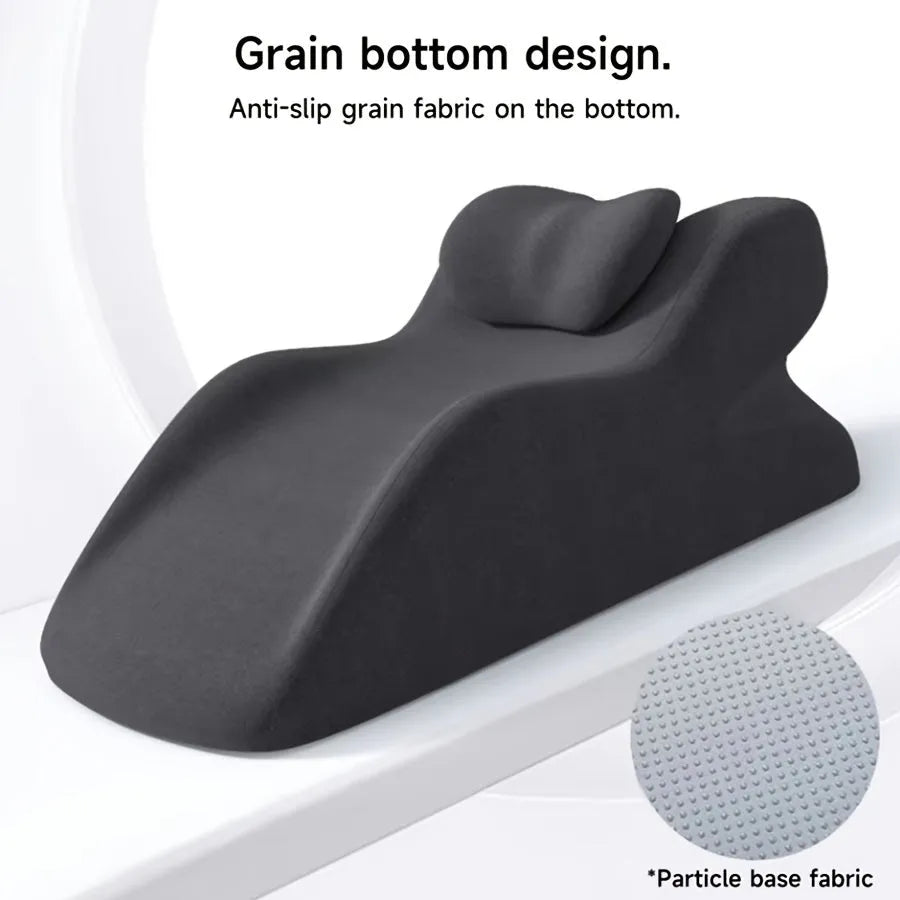 Stomach sleeper pillow in blue designed for front-lying positions, reading support, and phone use