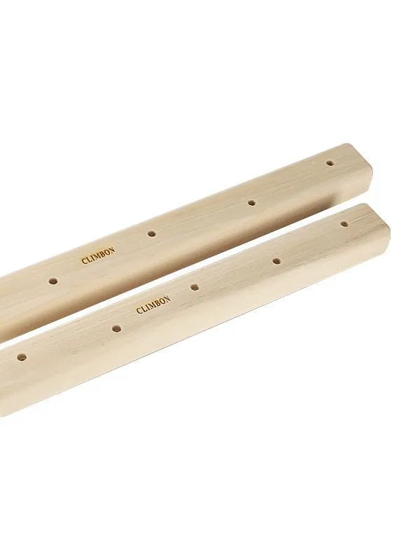 Set of three solid wood hangboards showing different lengths and ledge depths for grip strength training.