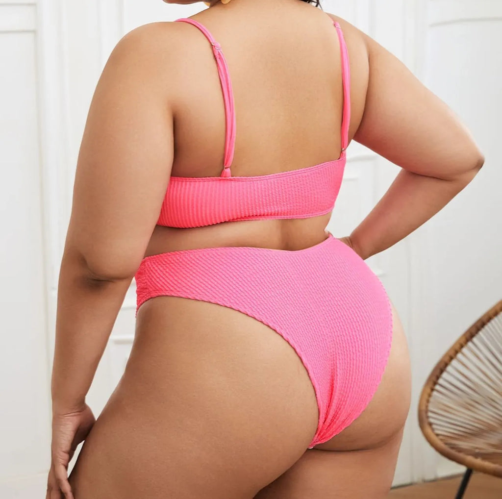 Plus-size pink two-piece bikini swimsuit with chest pad, sizes L to 4XL, 82% polyester