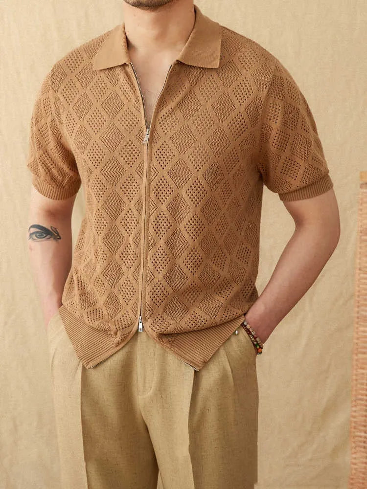 Light brown cotton zip-front cardigan with short sleeves and a lapel collar on a hanger.