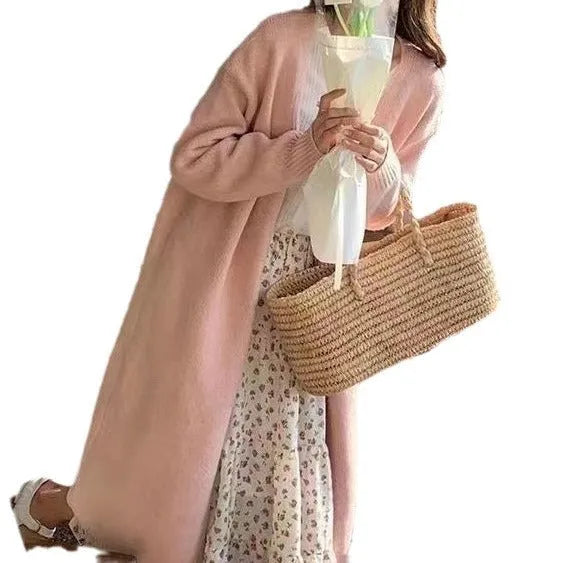 Women's loose fit mid-length knitted cardigan in a V-neck style, shown in khaki colour.