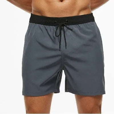 Men's blue stitching waist athletic shorts with a side zip pocket and drawstring