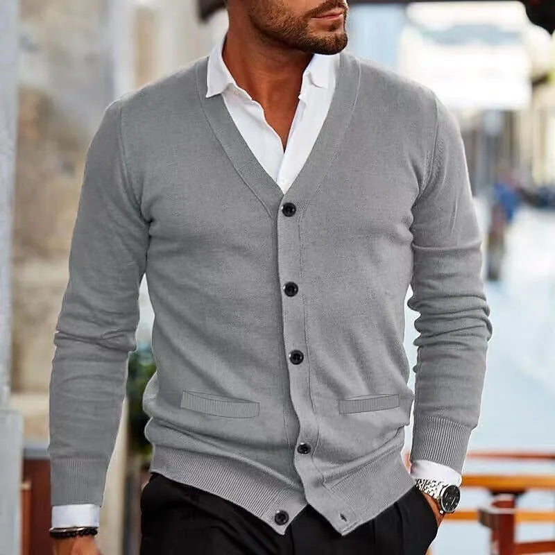 Men's slim fit acrylic cardigan sweater coat shown in creamy-white colour on a hanger.