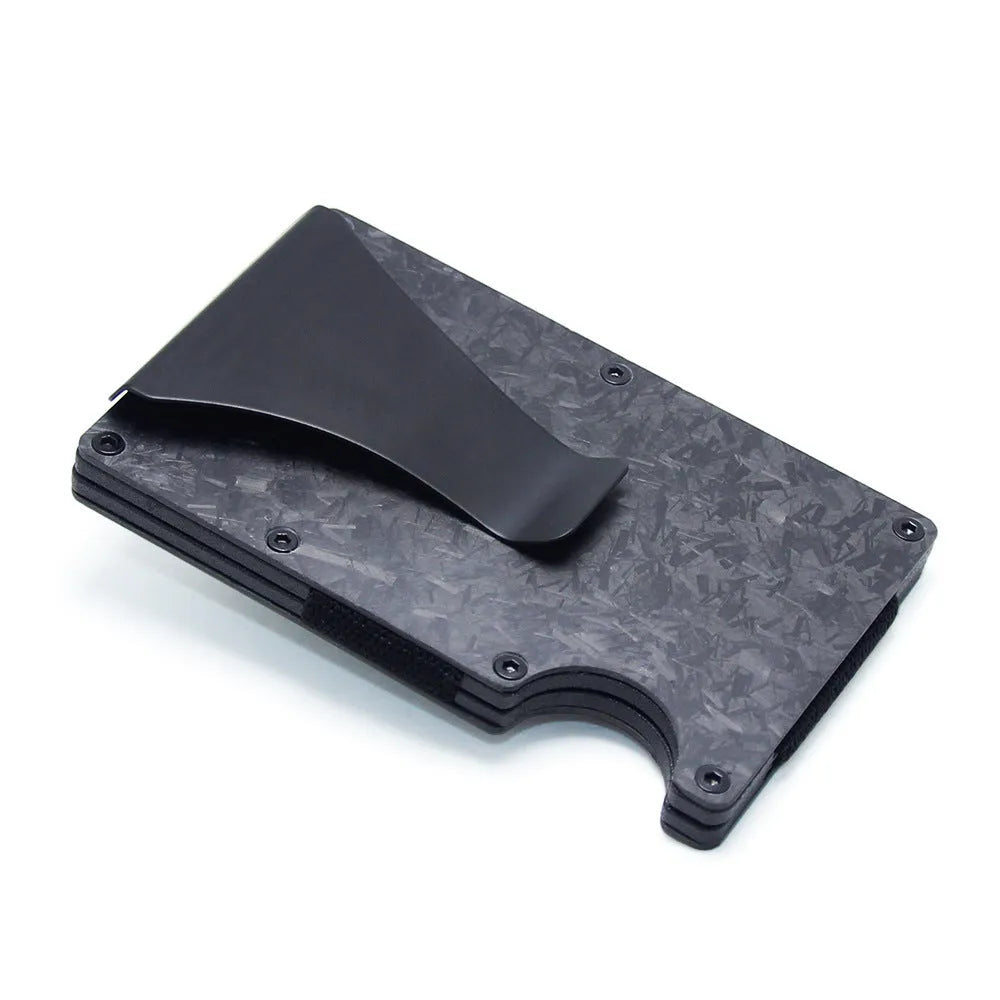 Geometric aluminium and carbon fibre card holder in multiple colours on a table, showing slim 8mm profile.