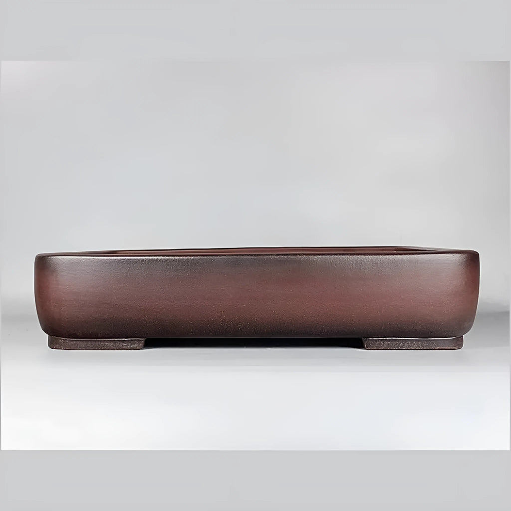 Handmade antique rectangular purple clay flower pot showing its size and shape.