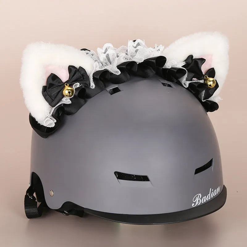 Plush fabric cartoon character helmet cover stretched over a blue hat for children's dress-up.