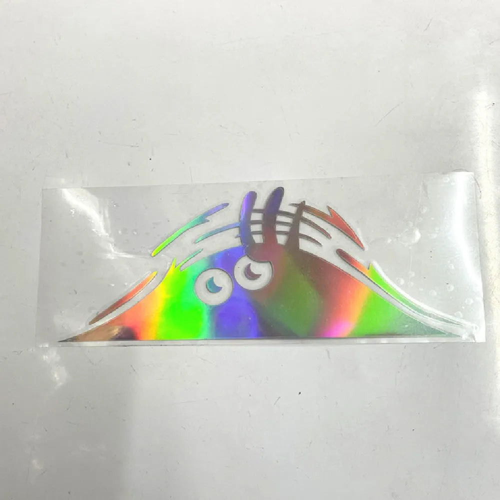 Self-adhesive body sticker with face design measuring 19cm by 7cm