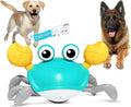 Blue and red electronic crawling crab dog toy with lights on a floor.