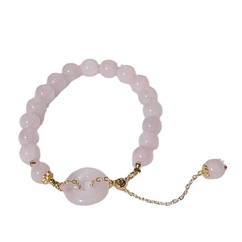 Pink crystal women's bracelet with peace buckle clasp and adjustable closure