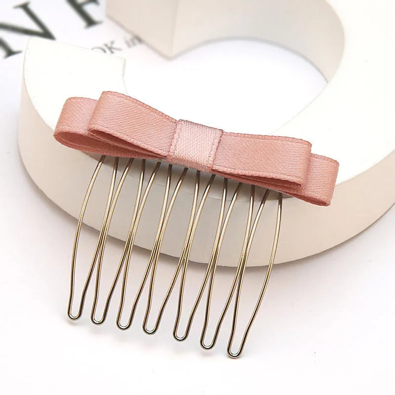 Retro bow hair comb with inlaid crystal decoration, available in six colours and two size options