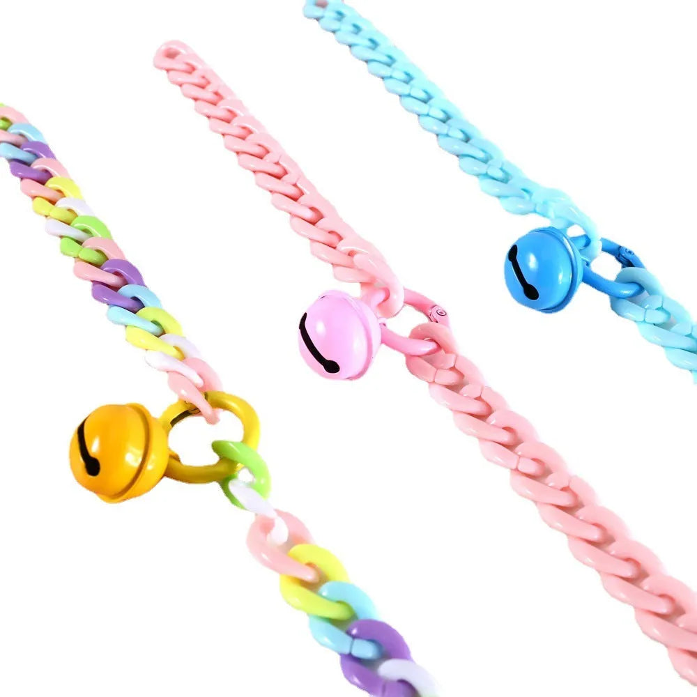 Adjustable plastic pet collar in candy chain blue colour on a white background, showing the monochrome pattern.