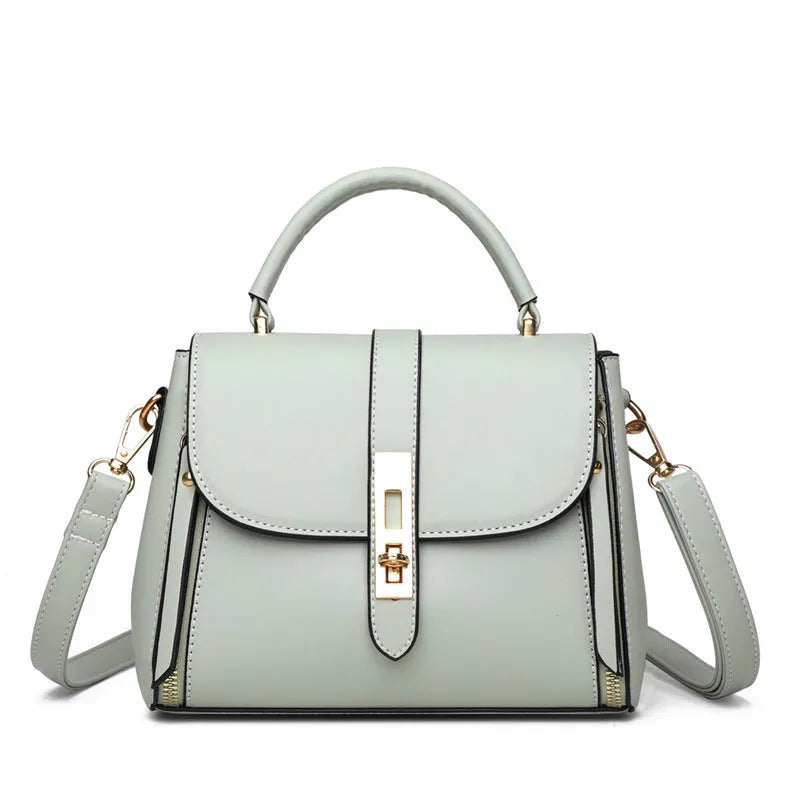 Black soft PU leather women's messenger bag with a single shoulder strap.