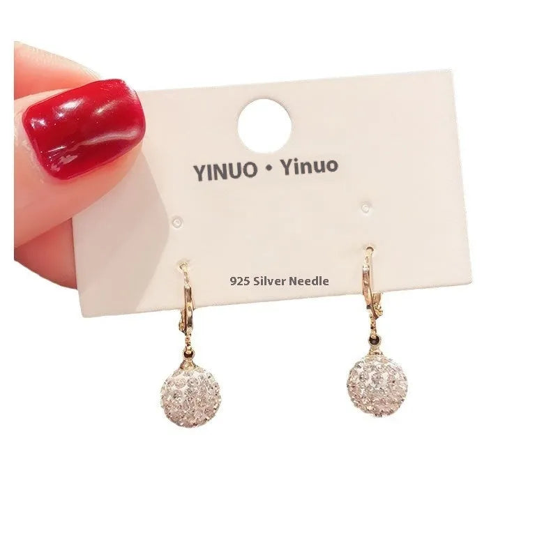 Geometric copper zircon earrings with rose design element in electroplated finish