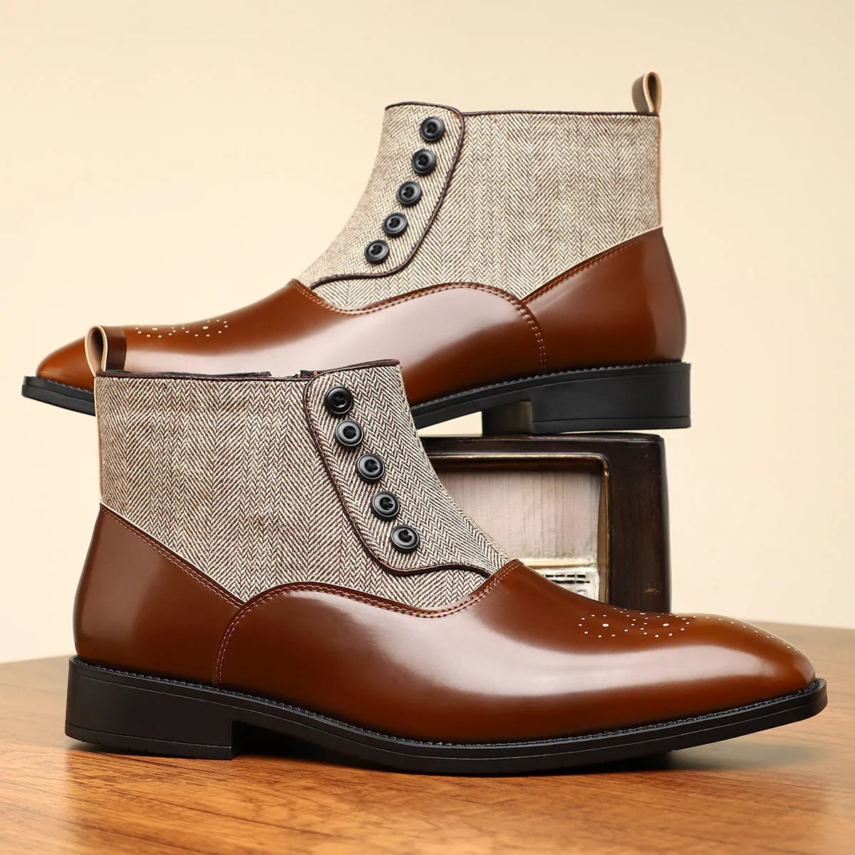 Men's brown formal shoes with side zipper, square toe, and low rubber sole on a neutral background